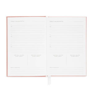 Softcover daily gratitude journal with prompts "Today I am grateful for" and "Today's intention"