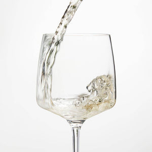 wine being poured into glass
