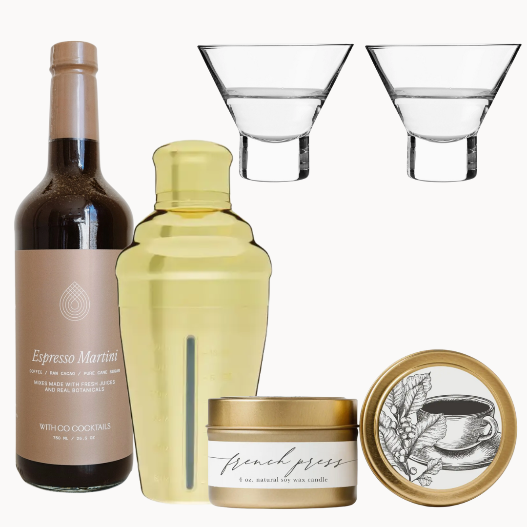 Collection of items including a bottle, shaker, candle, and glasses on a white background