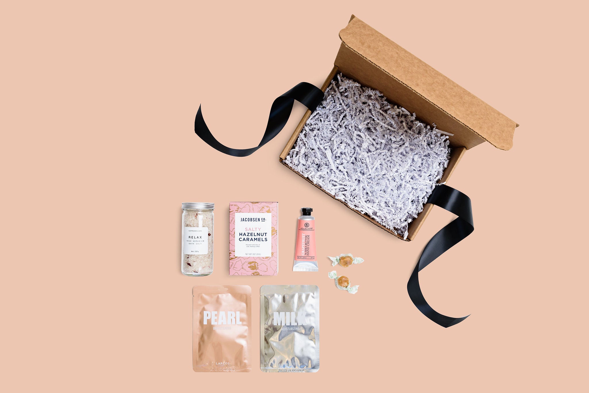 pamper me gift box items, pearl facemask, milk face mask, relax bath salts, salty hazelnuts caramels, hand cream